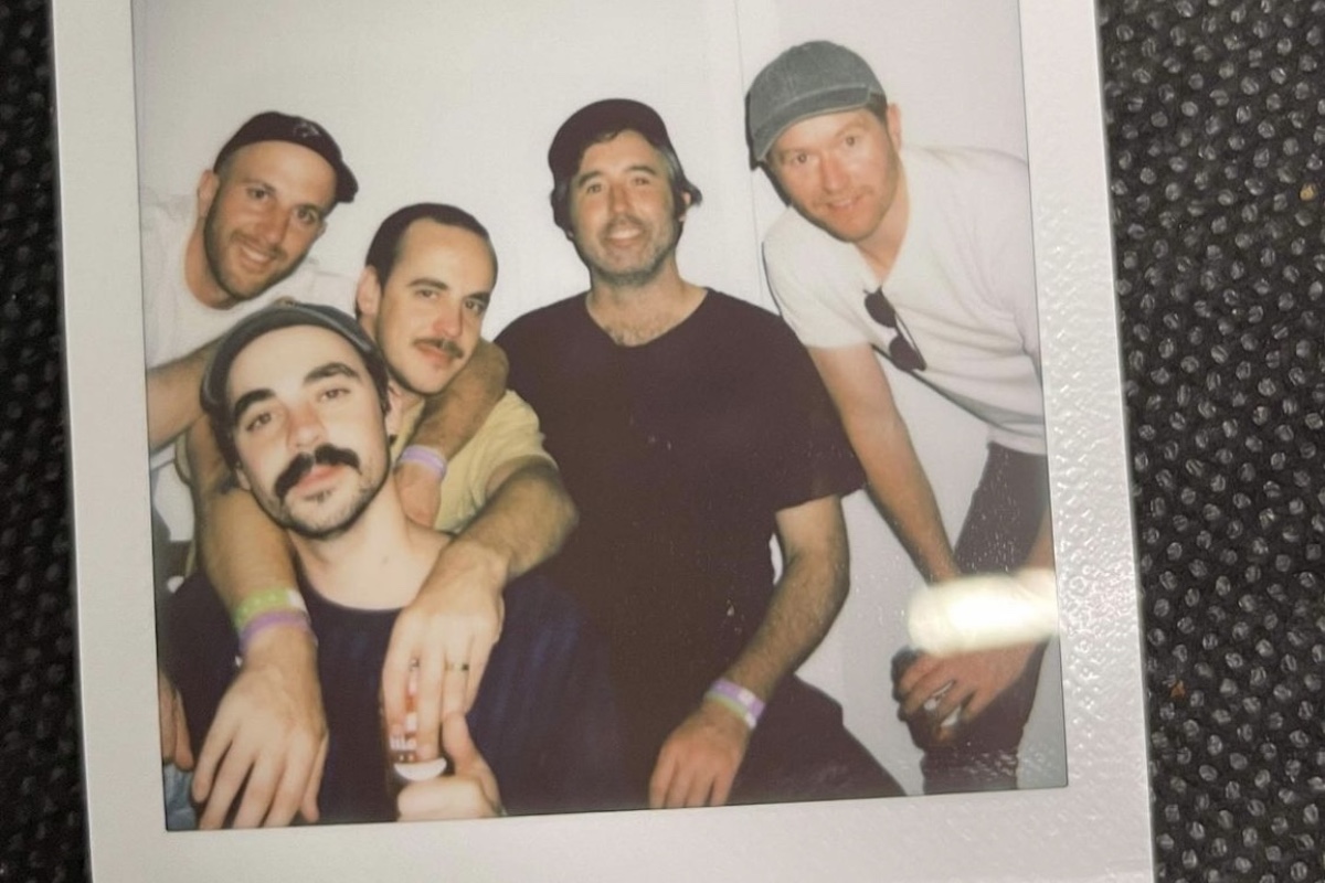 A Polaroid photo of the band Rolling Blackouts Coastal Fever on tour in the UK