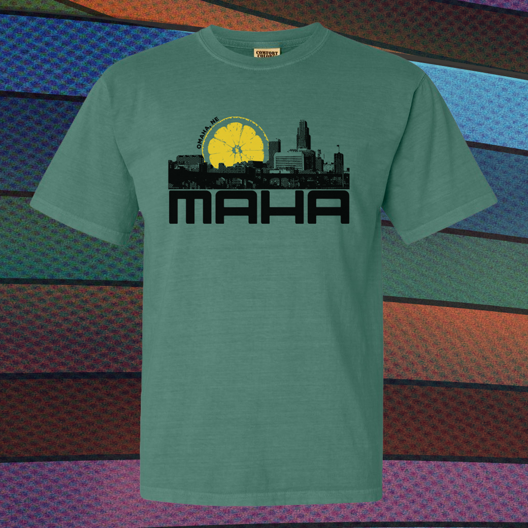 Green shirt with Omaha Skyline and lemon sky
